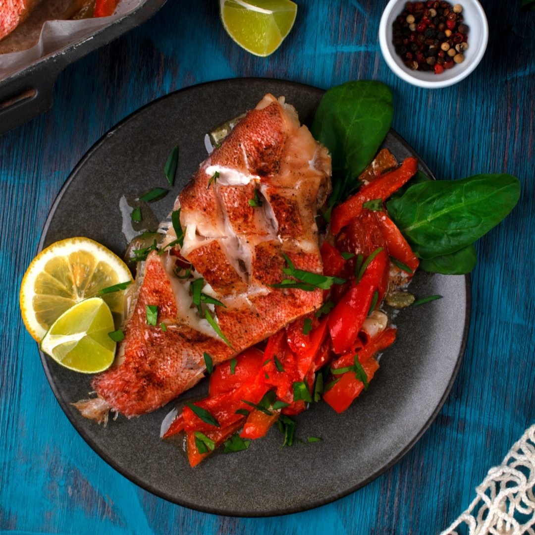 baked-redfish-or-perch-with-vegetables-served-on-t-2024-06-03-22-38-08-utc-scaled.jpg