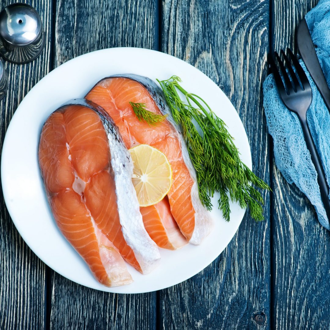 fresh salmon with spice on a table